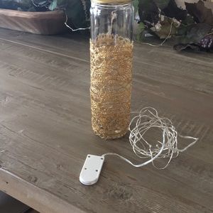 Fairy lights in pillar vase